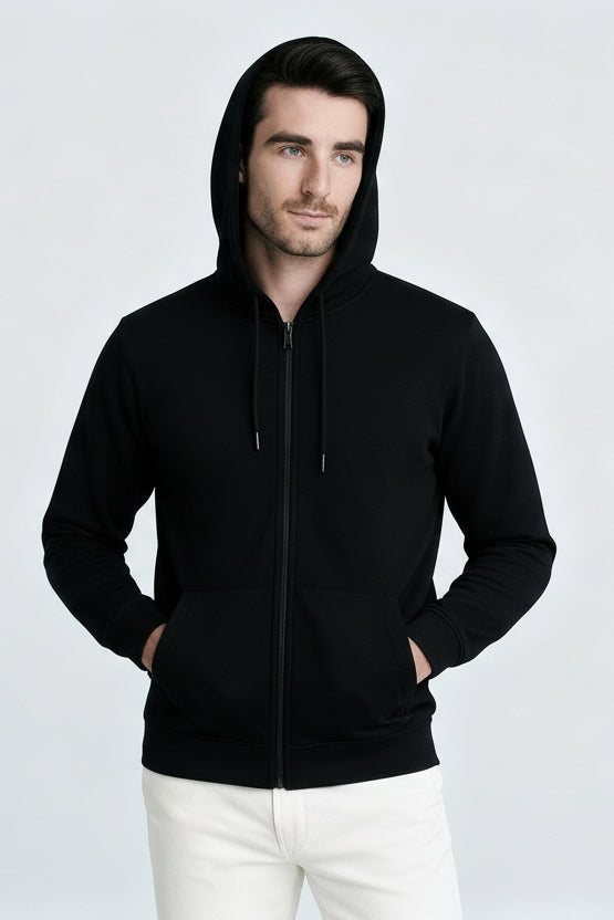 Man wearing a black jacket on a white background