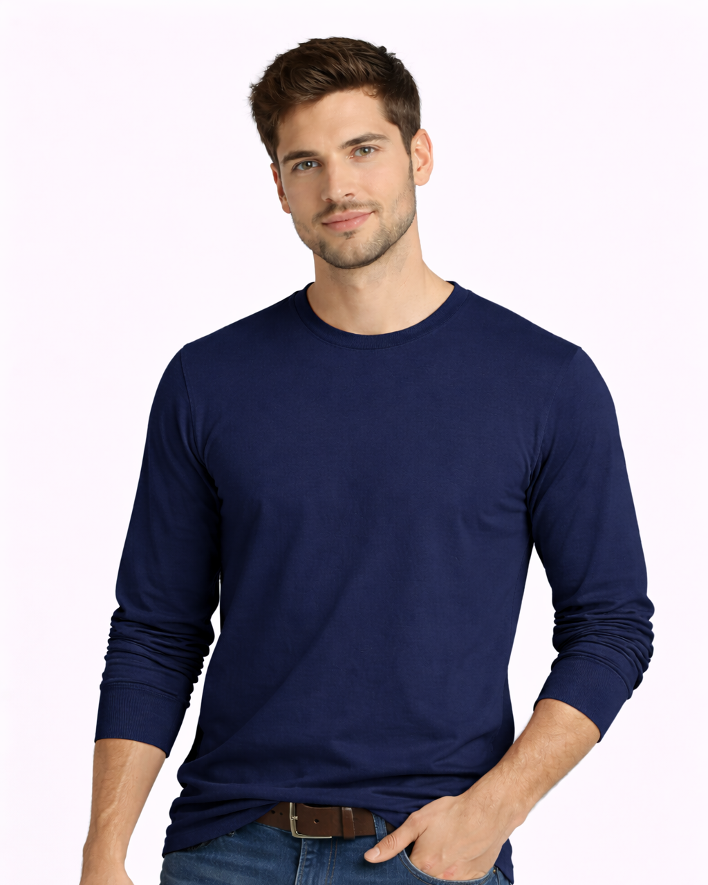 Man wearing a navy long-sleeve shirt and blue jeans on a white background