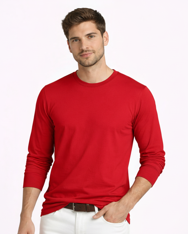 Man wearing a red long-sleeve shirt and blue jeans on a white background