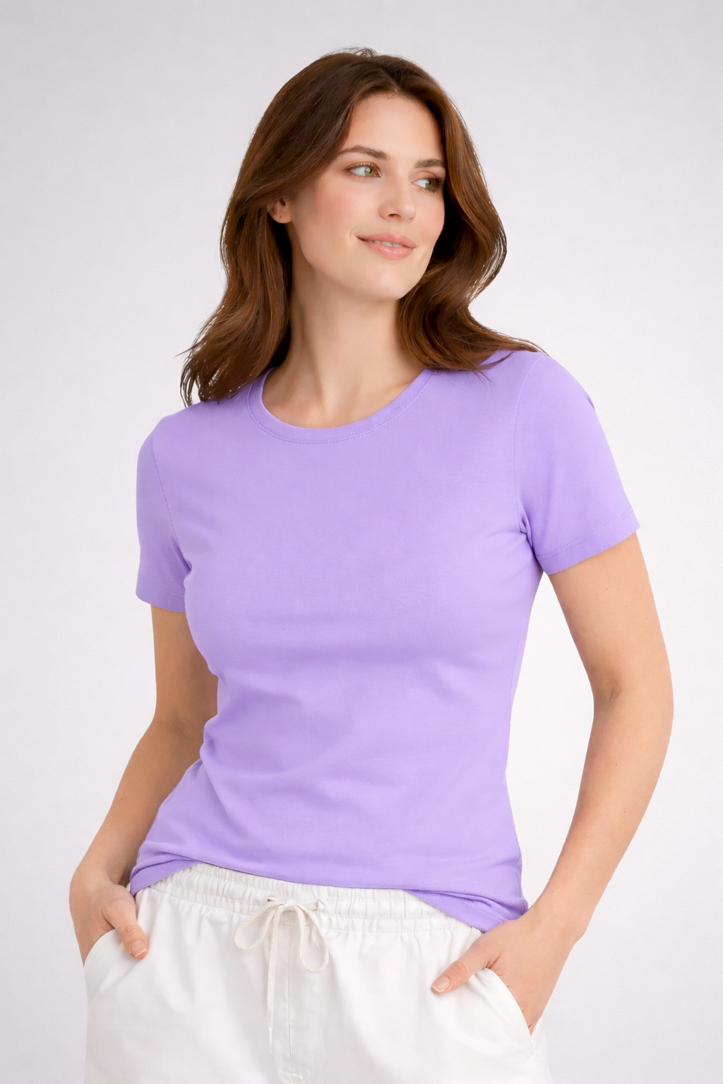 Woman wearing a purple t-shirt against a white background