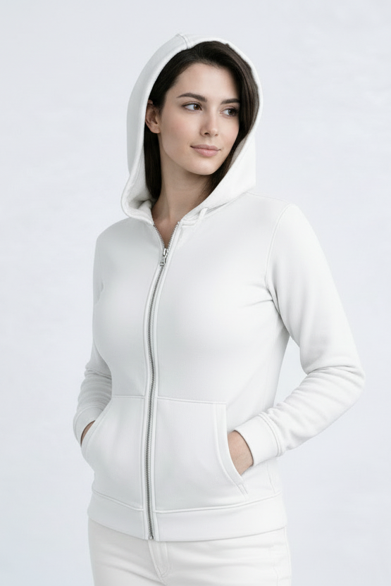 Woman wearing a white zip-up jacket on a light gray background